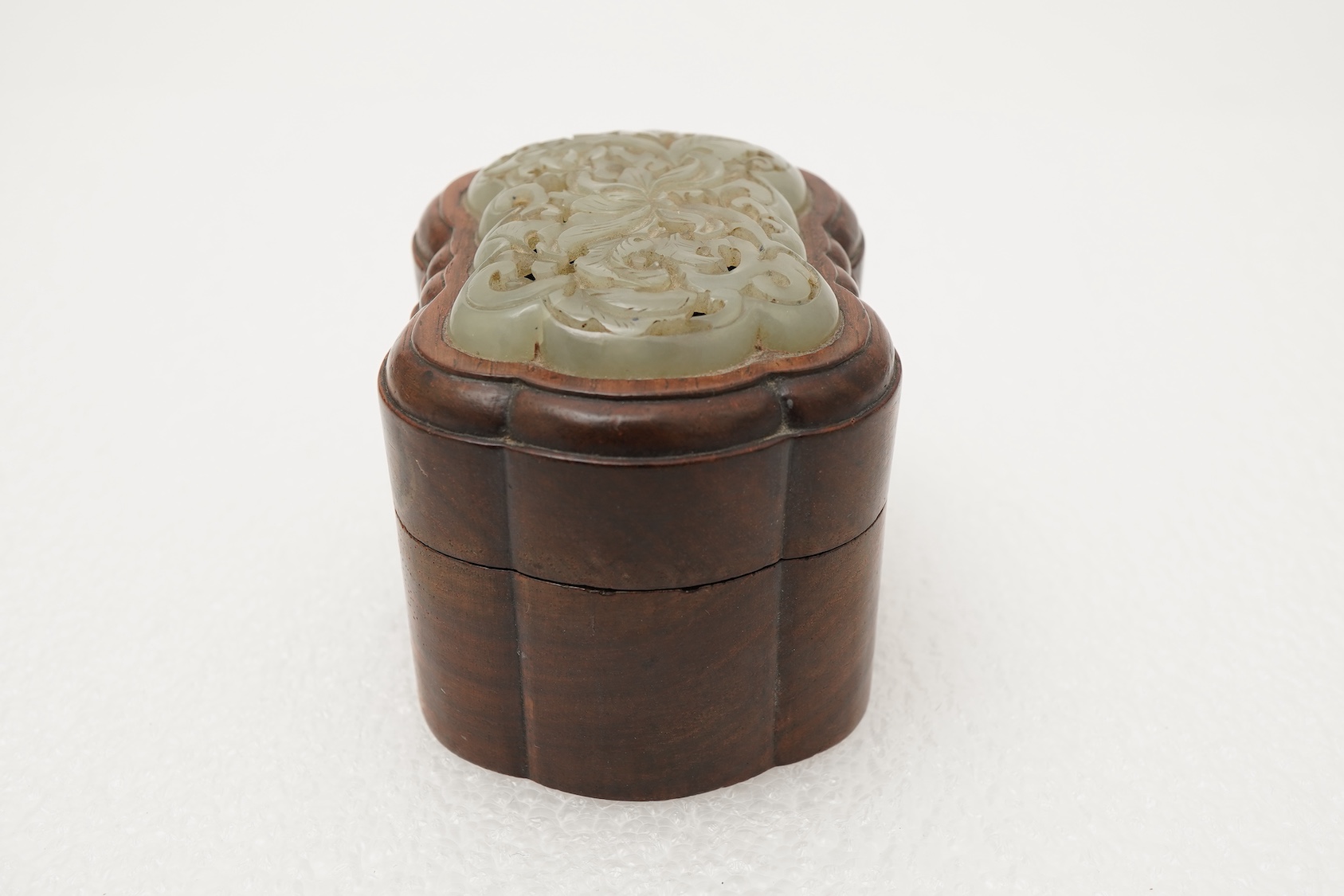 A Chinese jade mounted huanghuali box and cover, 19th century